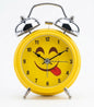 Retro Yellow Emoji Twin Bell Alarm Clock – Loud Mechanical Desk Clock with Tongue-Out Face, Cute Novelty Bedroom Decor for Kids & Teens