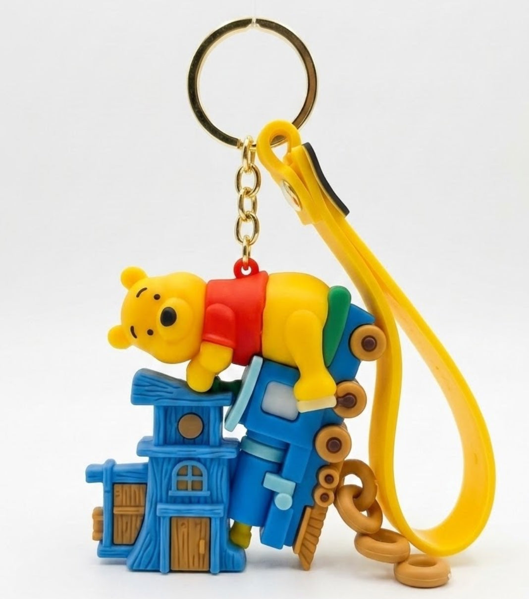 Winnie the Pooh Train Ride Silicone Keychain with Yellow Wrist Strap – Cute 3D Cartoon Bear Locomotive Backpack Charm & Key Ring Accessory